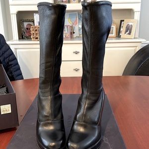 Prada luxe platform heeled stretch leather boots.